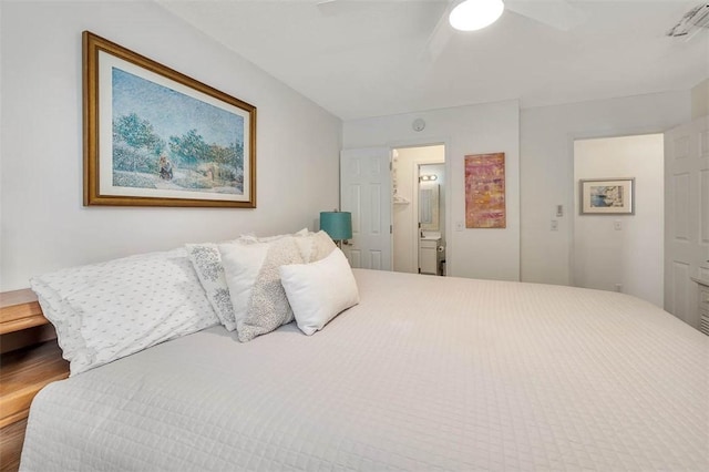 bedroom featuring hardwood / wood-style floors and ceiling fan