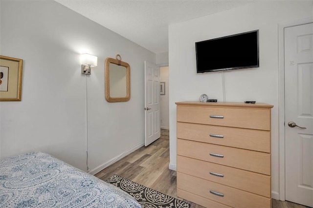 bedroom featuring light wood-type flooring