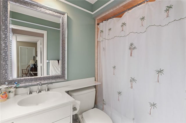 207 Military Rd, Saint Simons Island, GA 31522 - full bath featuring vanity, toilet, and a shower with shower curtain