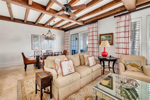 tiled living room with beamed ceiling and ceiling fan with notable chandelier