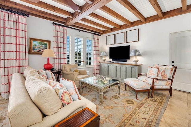 living room with beamed ceiling