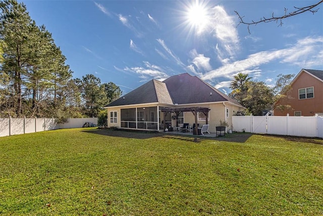 back of property featuring a pergola, a patio, and a lawn