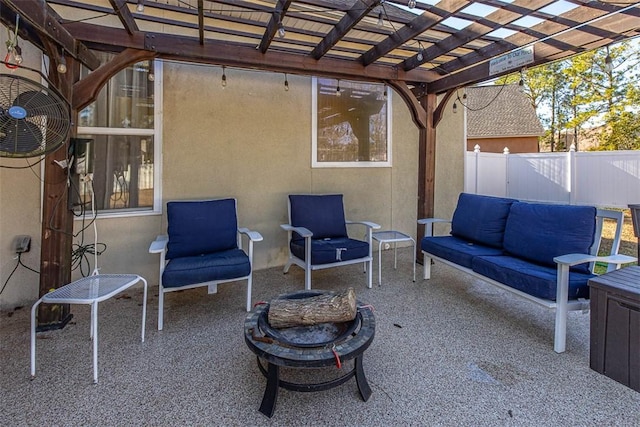 view of patio / terrace featuring a pergola and an outdoor living space with a fire pit