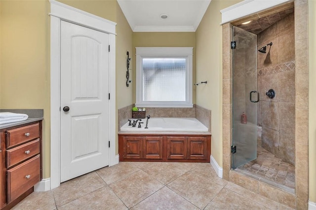 bathroom featuring tile patterned floors, vanity, ornamental molding, and shower with separate bathtub