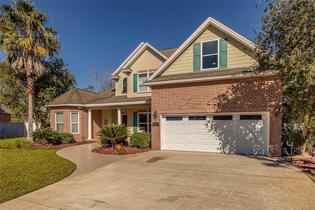 view of front of home with a garage and a front lawn