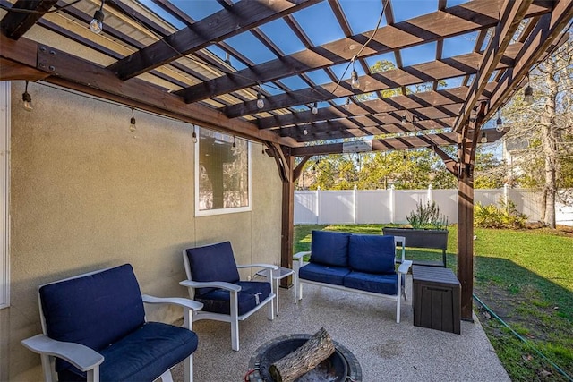 view of patio with a pergola and an outdoor living space with a fire pit