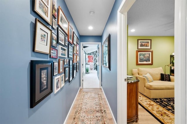 552 Old Plantation Rd, Jekyll Island, GA 31527 - hallway featuring light wood-type flooring and recessed lighting