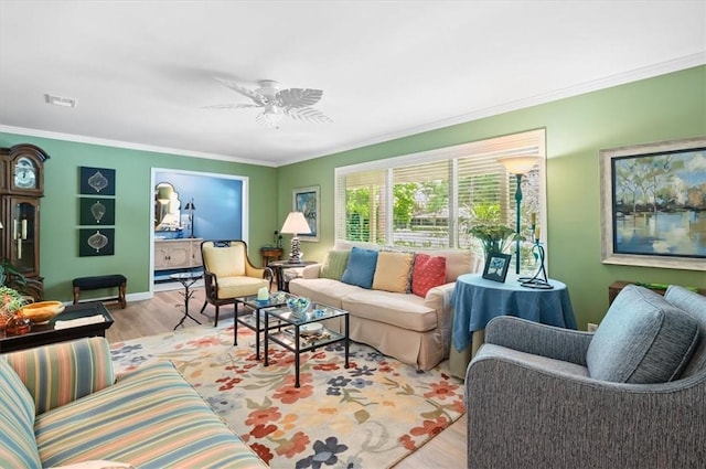 552 Old Plantation Rd, Jekyll Island, GA 31527 - living area featuring light wood finished floors, ornamental molding, and ceiling fan