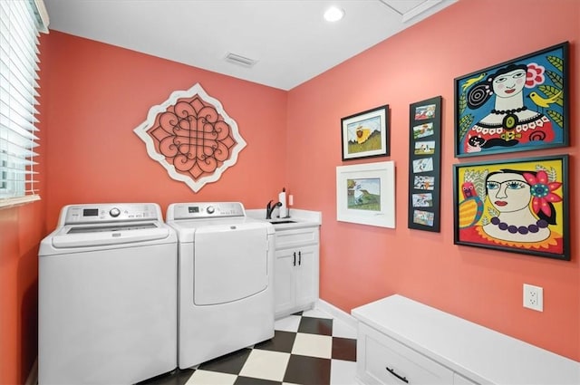 552 Old Plantation Rd, Jekyll Island, GA 31527 - laundry room featuring tile patterned floors, washer and dryer, cabinet space, and recessed lighting
