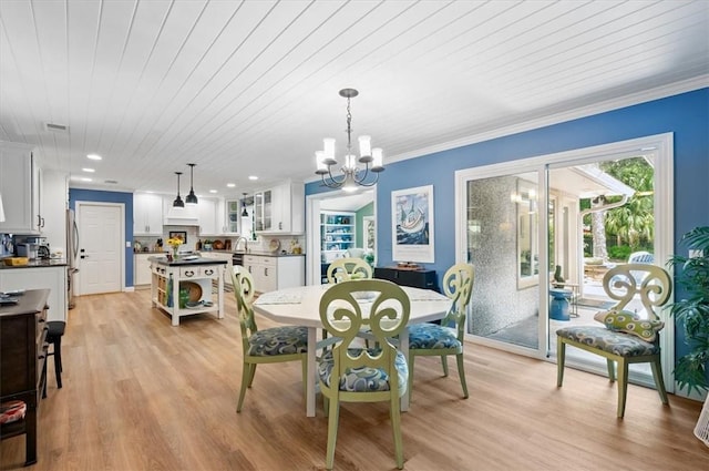 552 Old Plantation Rd, Jekyll Island, GA 31527 - dining room with a chandelier, light wood-type flooring, ornamental molding, wooden ceiling, and recessed lighting