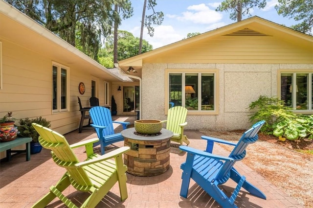 552 Old Plantation Rd, Jekyll Island, GA 31527 - view of patio / terrace with an outdoor fire pit