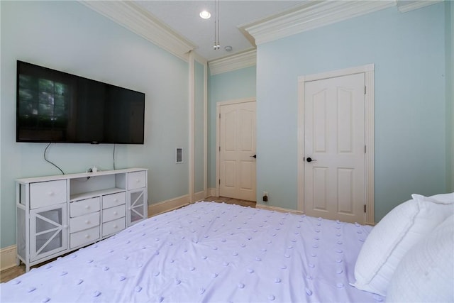 bedroom with crown molding