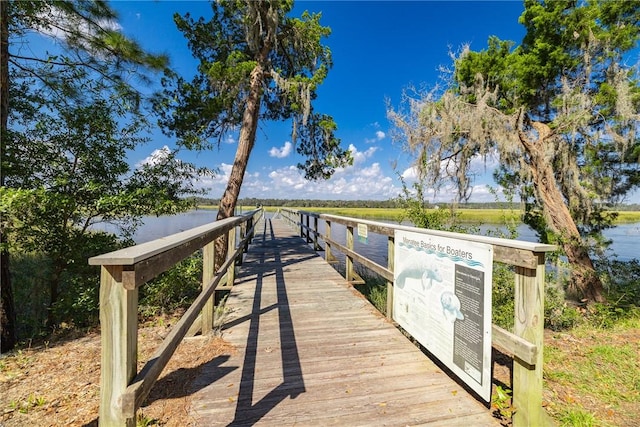 view of dock with a water view