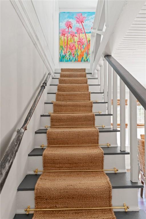 405 Everett St, Saint Simons Island, GA 31522 - stairway featuring baseboards