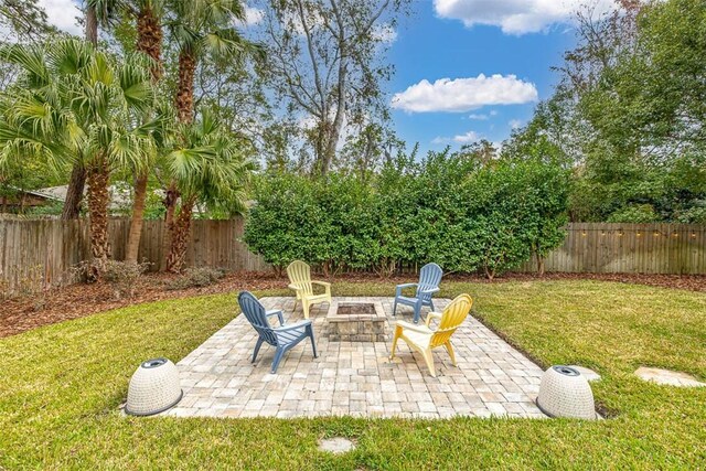246 Alabama St, Saint Simons Island, GA 31522 - view of patio / terrace with a fire pit
