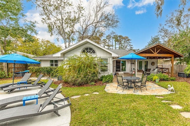 246 Alabama St, Saint Simons Island, GA 31522 - view of yard featuring a patio area