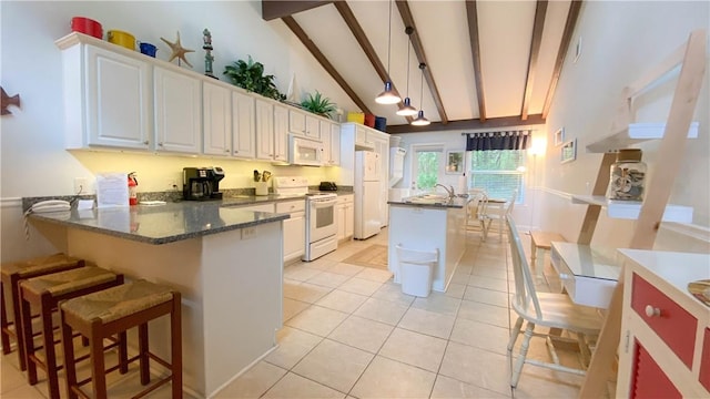 kitchen with white appliances, high vaulted ceiling, white cabinetry, light tile patterned floors, and beamed ceiling