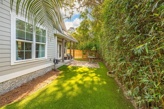 107 Reynoso Ave, Saint Simons Island, GA 31522 - view of yard with a patio
