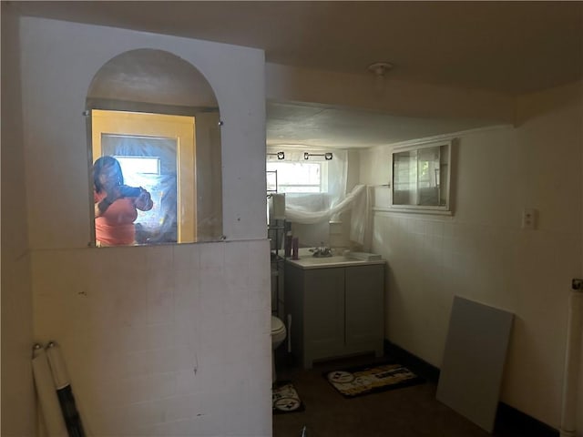 1308 Martin Luther King Jr Blvd, Brunswick, GA 31520 - bathroom with vanity and tile walls