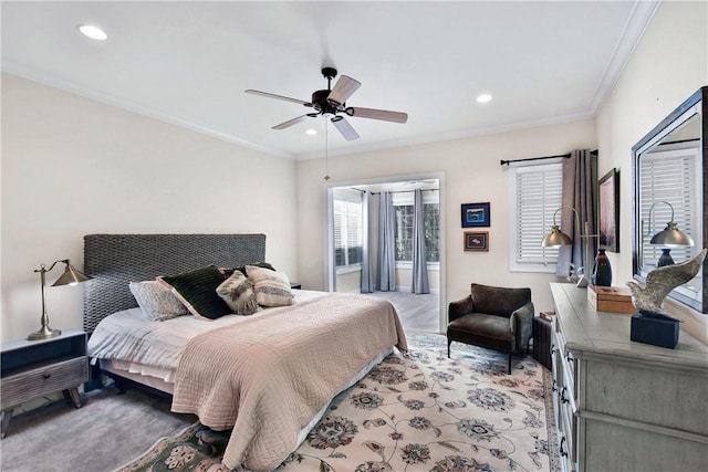 bedroom featuring ceiling fan, light colored carpet, and ornamental molding