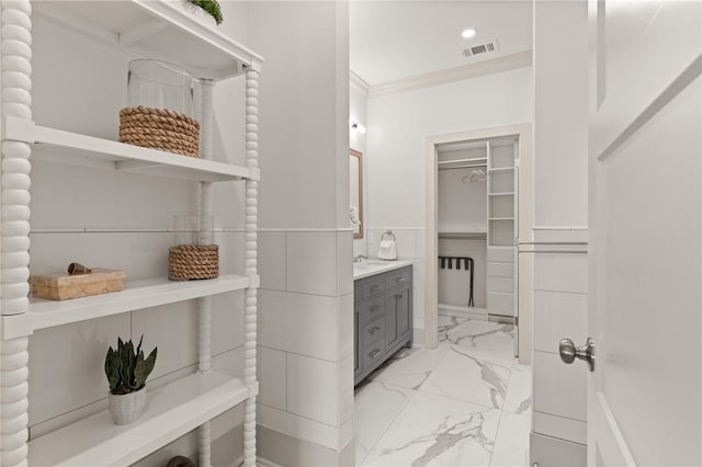 spacious closet with visible vents and marble finish floor