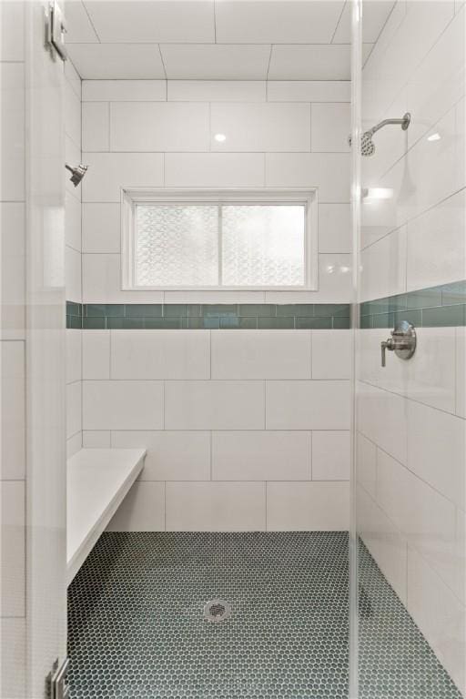 bathroom featuring a shower stall