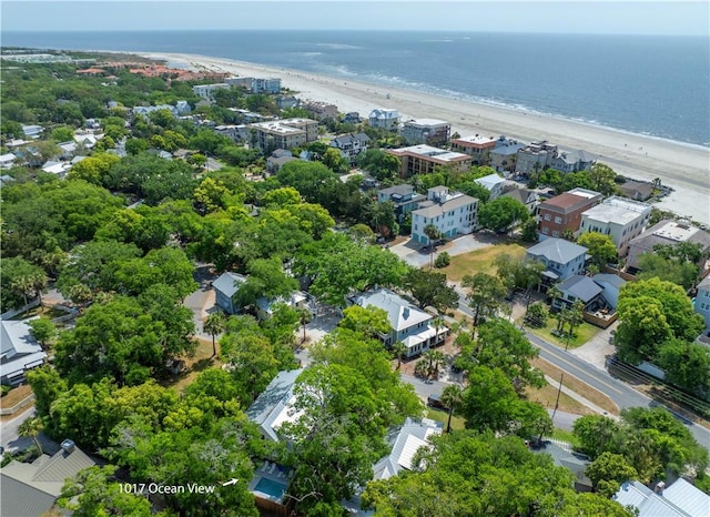 drone / aerial view with a beach view and a water view