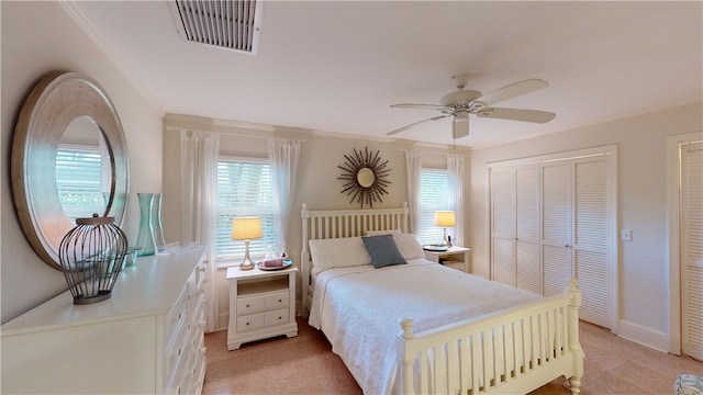 635 Old Plantation Rd, Jekyll Island, GA 31527 - bedroom featuring ornamental molding, a ceiling fan, and visible vents