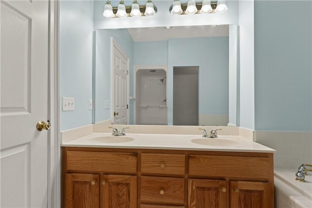 full bath featuring double vanity and a tub