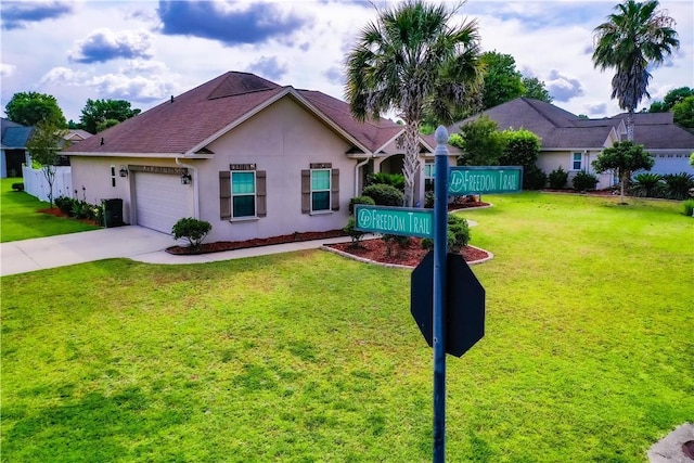 550 Freedom Trl, Brunswick, GA 31525 - ranch-style home with a garage and a front yard