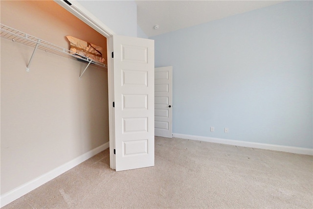 550 Freedom Trl, Brunswick, GA 31525 - unfurnished bedroom with light colored carpet and a closet