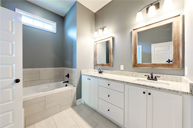 550 Freedom Trl, Brunswick, GA 31525 - bathroom featuring vanity, tiled bath, and tile patterned floors