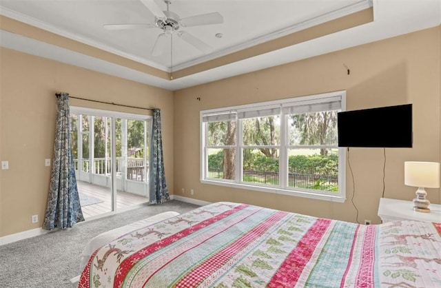 704 Dungeness, Saint Simons Island, GA 31522 - bedroom with access to outside, carpet, crown molding, a raised ceiling, and ceiling fan