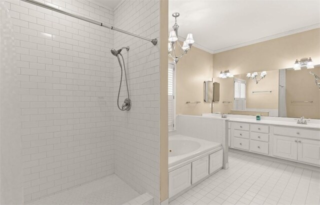 704 Dungeness, Saint Simons Island, GA 31522 - bathroom with a chandelier, ornamental molding, double vanity, tiled shower, and tile patterned flooring