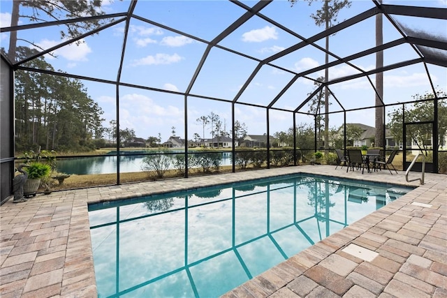 view of pool with a water view, a lanai, and a patio