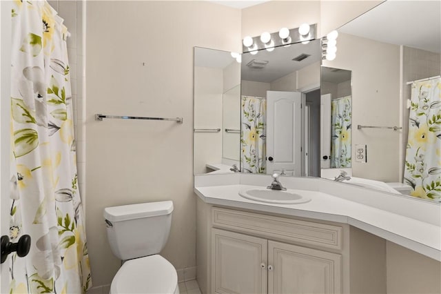 bathroom with a shower with curtain, vanity, and toilet