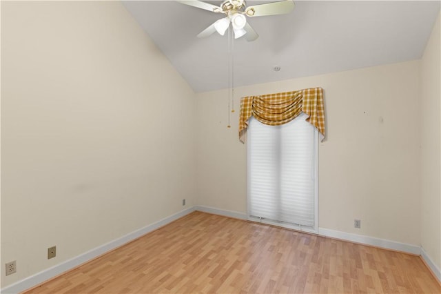 unfurnished room featuring vaulted ceiling, ceiling fan, and light hardwood / wood-style flooring