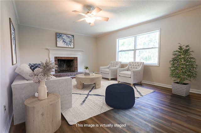 140 Belle Point Pkwy, Brunswick, GA 31525 - living area featuring wood finished floors, crown molding, a ceiling fan, and a fireplace