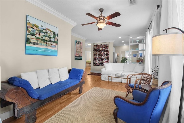 800 Wayne St, Darien, GA 31305 - living area with ceiling fan, ornamental molding, wood finished floors, and recessed lighting
