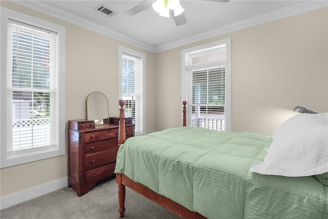 800 Wayne St, Darien, GA 31305 - bedroom with baseboards, carpet floors, crown molding, multiple windows, and a ceiling fan
