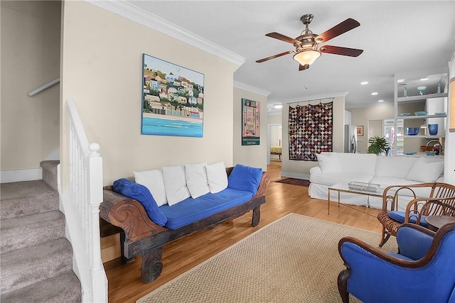800 Wayne St, Darien, GA 31305 - living area featuring crown molding, a ceiling fan, stairs, wood finished floors, and baseboards