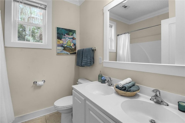800 Wayne St, Darien, GA 31305 - full bath with crown molding, toilet, double vanity, tile patterned floors, and a shower with shower curtain