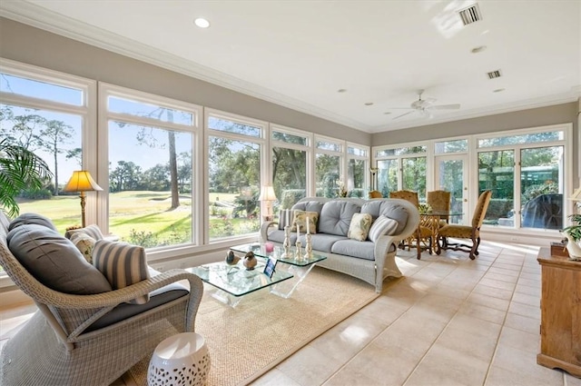 sunroom featuring ceiling fan