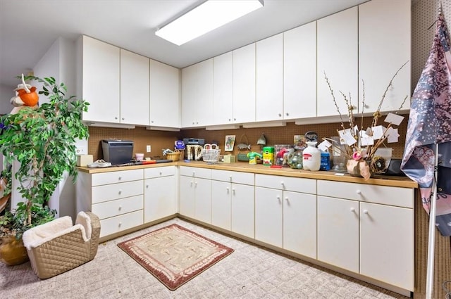 kitchen with white cabinetry