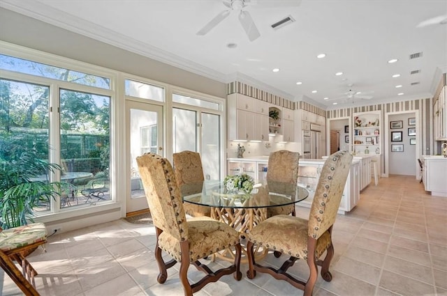 dining area with built in shelves, light tile patterned floors, ceiling fan, and ornamental molding