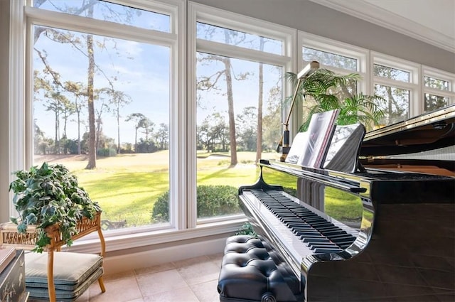 misc room featuring ornamental molding and light tile patterned flooring