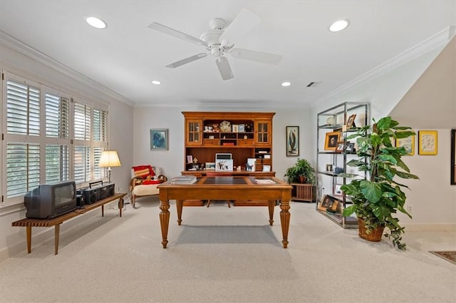 carpeted home office with ceiling fan and crown molding