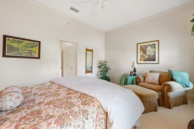 bedroom with carpet, ceiling fan, and crown molding