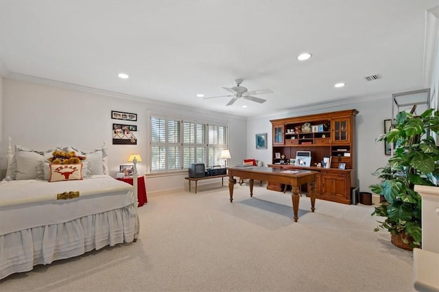 office space featuring ceiling fan, light colored carpet, and ornamental molding