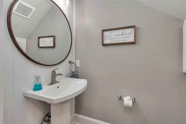 bathroom featuring a sink and visible vents